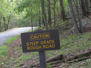 Caution Steep Grade Rough Road